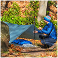 Hiker with a tarp Mount trail for long hikes, outdoors and camping.