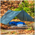 Tarp an ultralight place in dyneema composite fabric (cuben fiber) for hiking, outdoor and camping with sleeping bag.